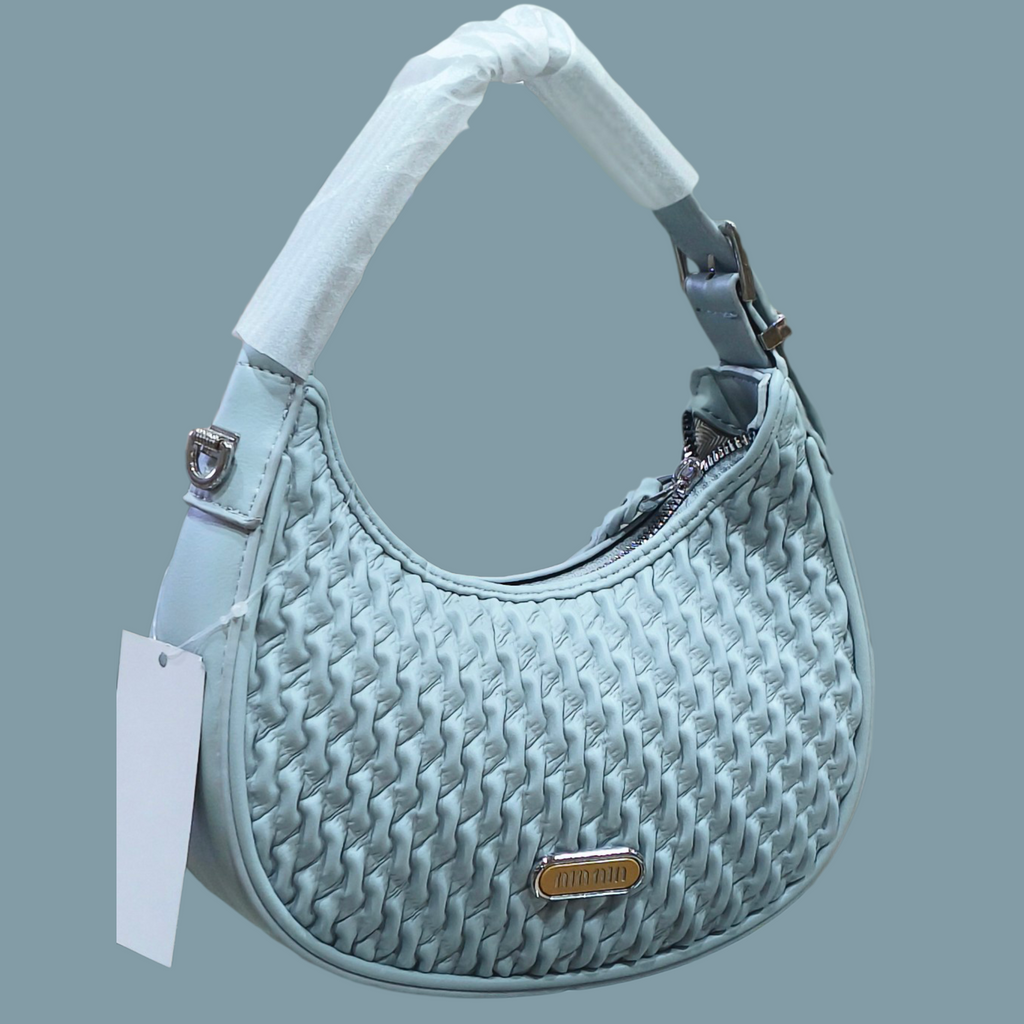 light pink, woven-textured
shoulder bag with a silver-toned metal