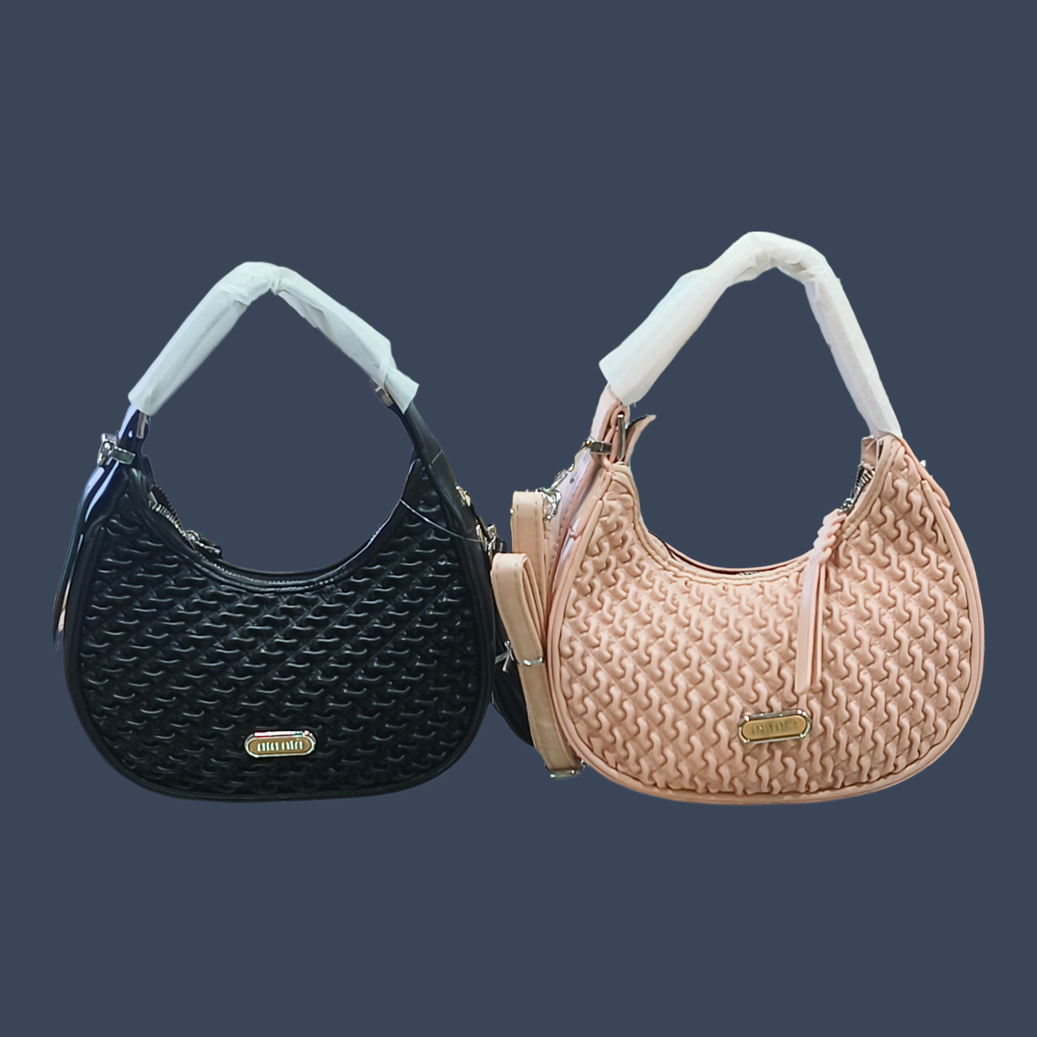 light pink, woven-textured
shoulder bag with a silver-toned metal